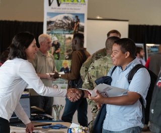 Photo of students connecting with employers