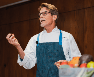 Chef Rick Bayless in an apron