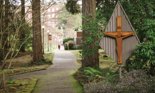 Crucifix iconography outside on a wooded path