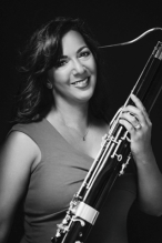 Photo of Cheryl Phillps, holding her bassoon