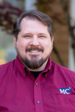 Headshot of James Farley