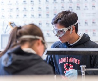 Photo of Ernsdorff lab with students in goggles