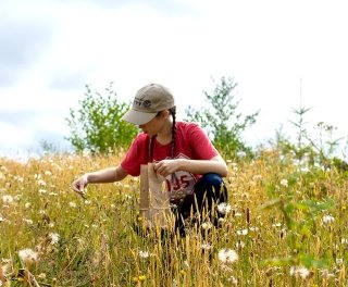 Photo of a student in a field