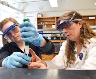 Photo of SMU Chemistry professor and student in lab