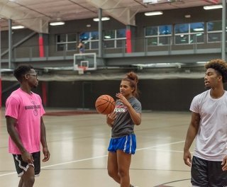 Photo of students playing basketball