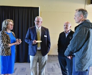 Photo of members having a discussion