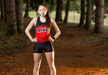 Photo of Cassidy Walchak-Sloan on forest trail