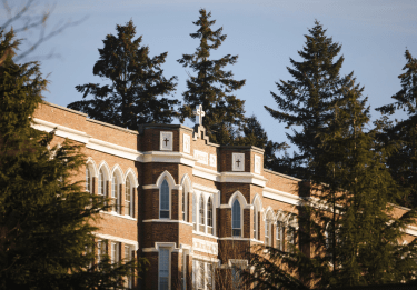 Old Main surrounded by trees