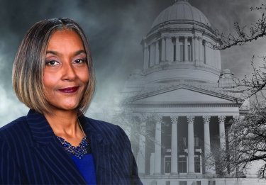 Headshot of Melanie Morgan with capitol building behind