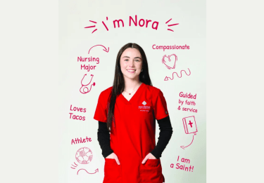 Student in red scrubs, with text saying "I'm Nora; nursing major; compassionate; loves tacos; athlete"