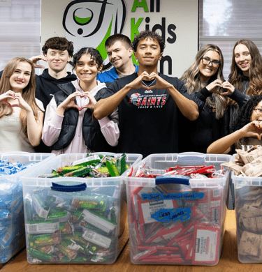 Students work at All Kids Win for charity