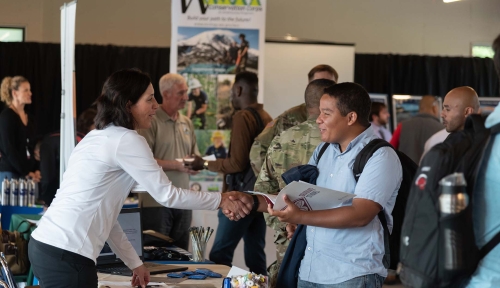 Photo of students connecting with employers