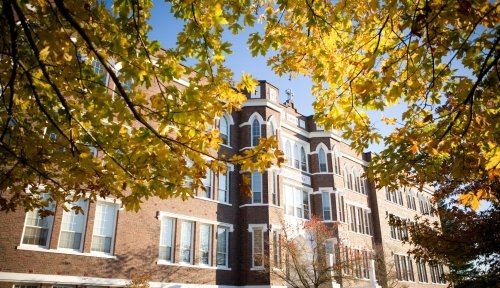 Header_OldSaintMartinsFall.jpg Photo of Old Main with yellow leaves