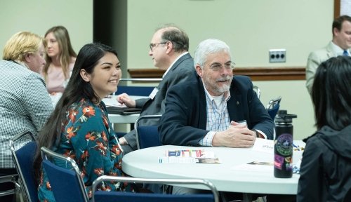 Photo of students connecting with employers