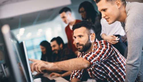 Photo of students at computer