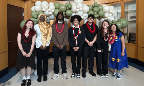 Group photo of Act Six 2024 cohort under balloon arch