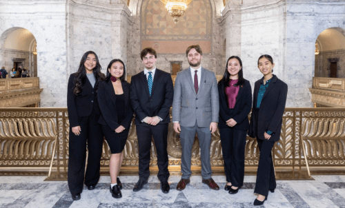 Photo of six interns in the Capitol building