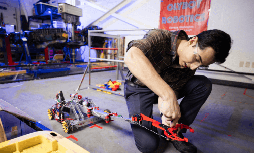 A student works on a robot