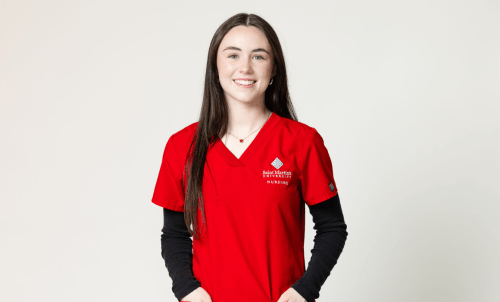 Student in red scrubs