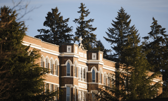 Old Main surrounded by trees