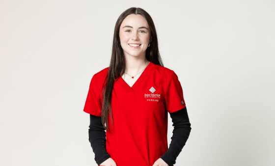 Student in red scrubs