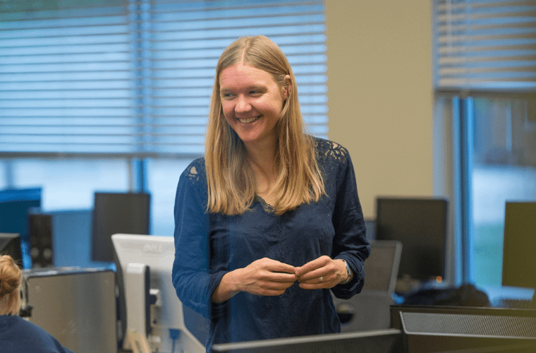 Andrea Kunder in a classroom with computers