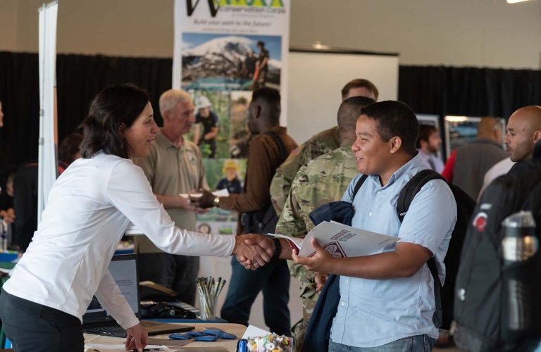 Photo of students connecting with employers