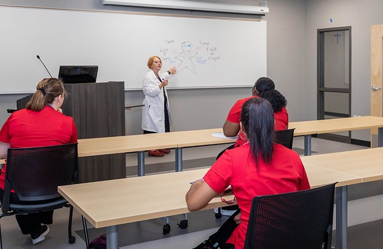 Photo of a group of students being taught