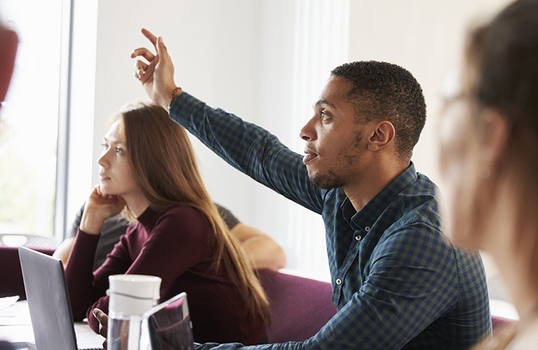 Photo of a student in class