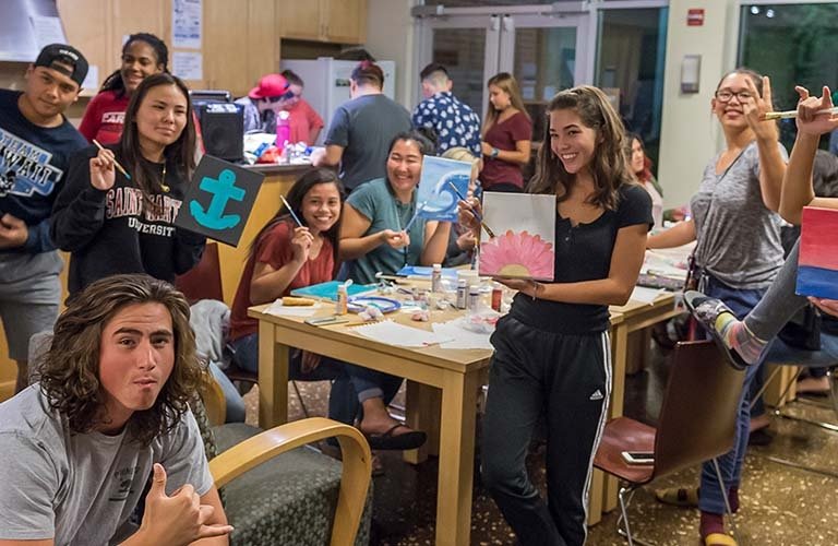 Photo of residents at painting event