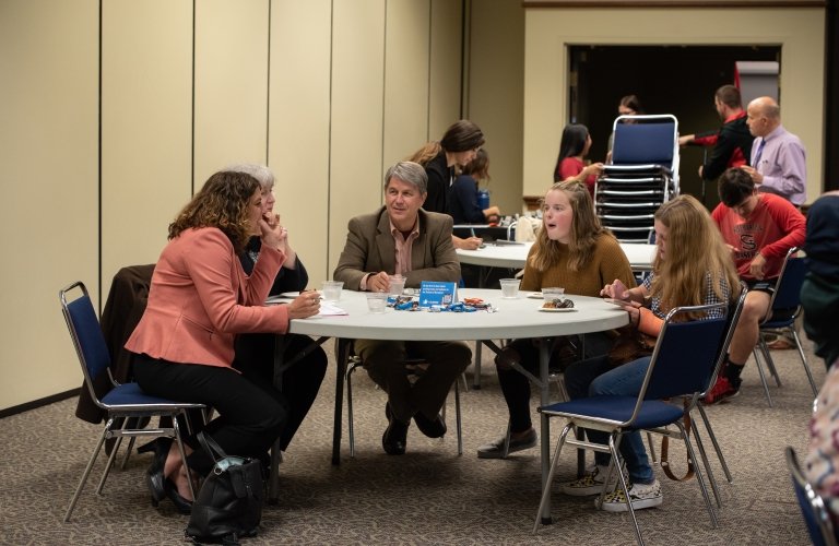 Photo of business lecture series attendees
