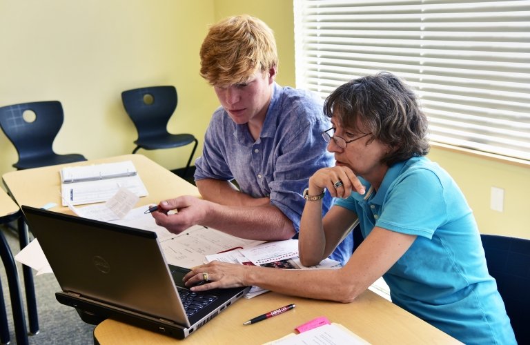Photo of student and advisor
