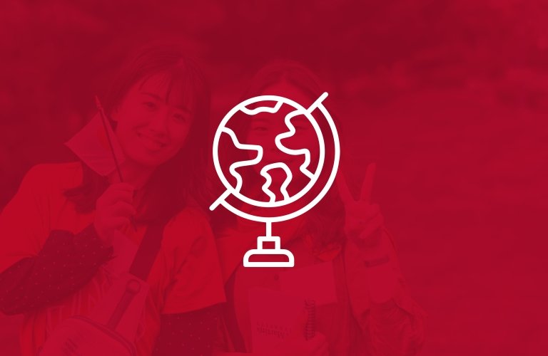 Icon: white globe overlaid on red image with two students holding a flag and smiling for the camera