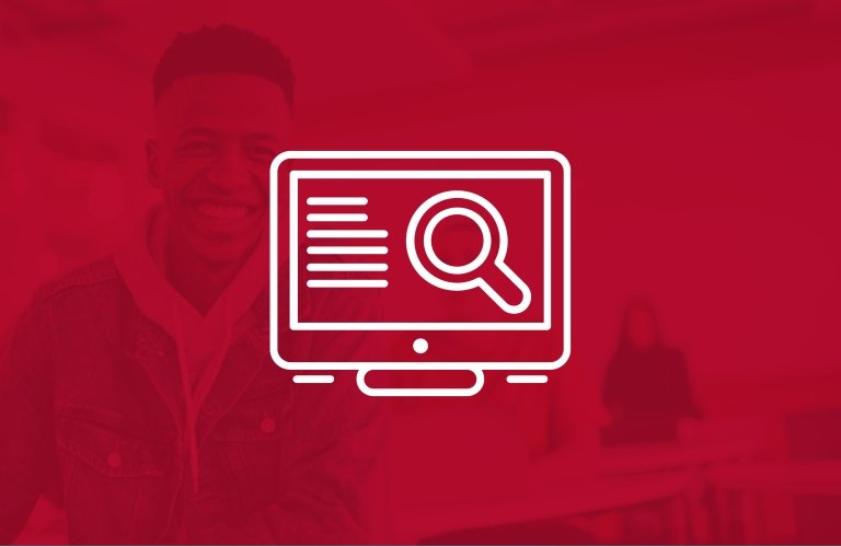 A student smiles for the camera under a red filter, overlaid with a white icon depicting a magnifying glass on a computer