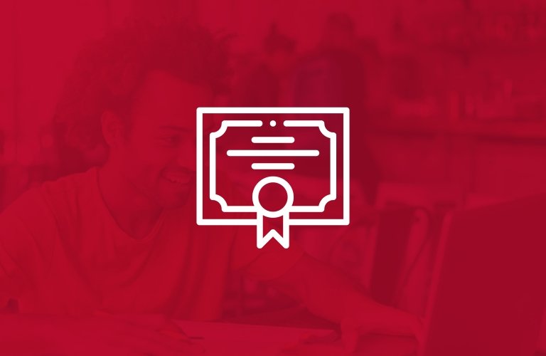 A student works at a computer under a red filter, overlaid with a white icon depicting a certificate