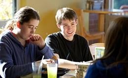 Photo of students gathered in dining hall