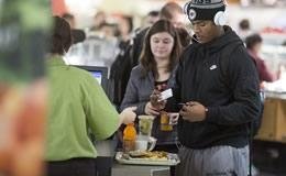 Photo of student paying with ID card