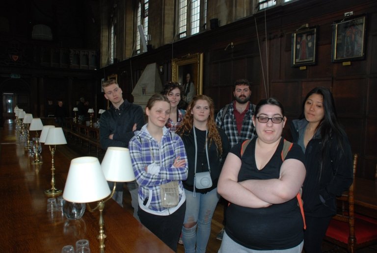 Students taking a tour of an Oxford dining hall