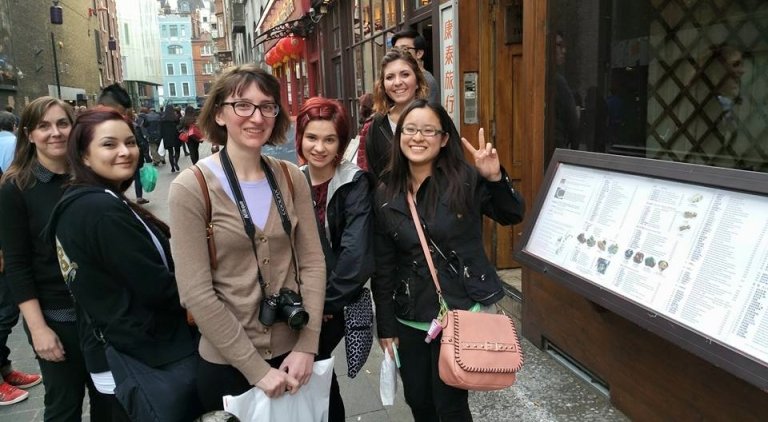 Students pose on a London street