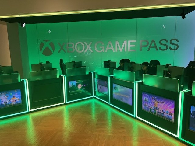 Glowing green room with text that says XBOX game pass