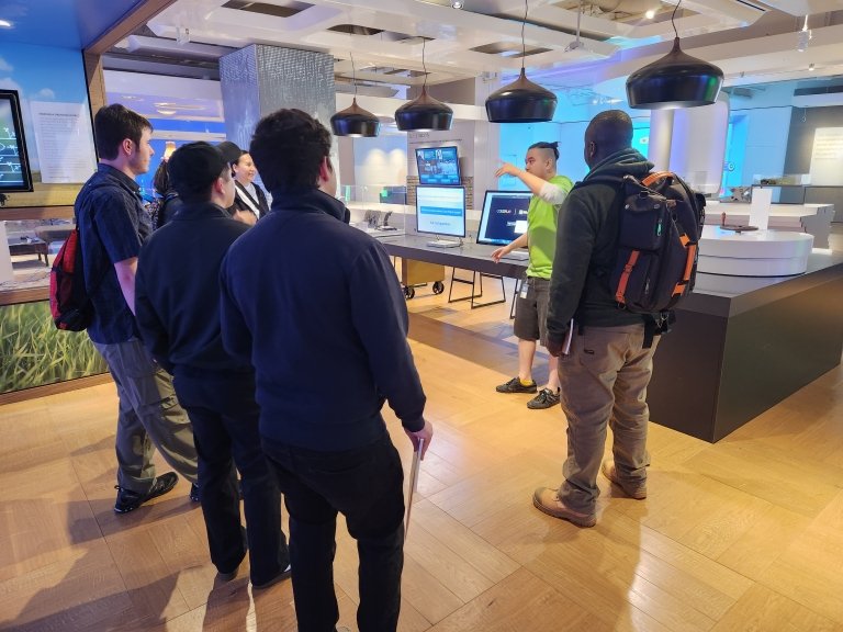Students listen to a tour guide at Microsoft