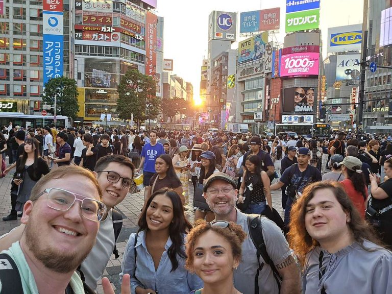 Students and faculty on a busy street
