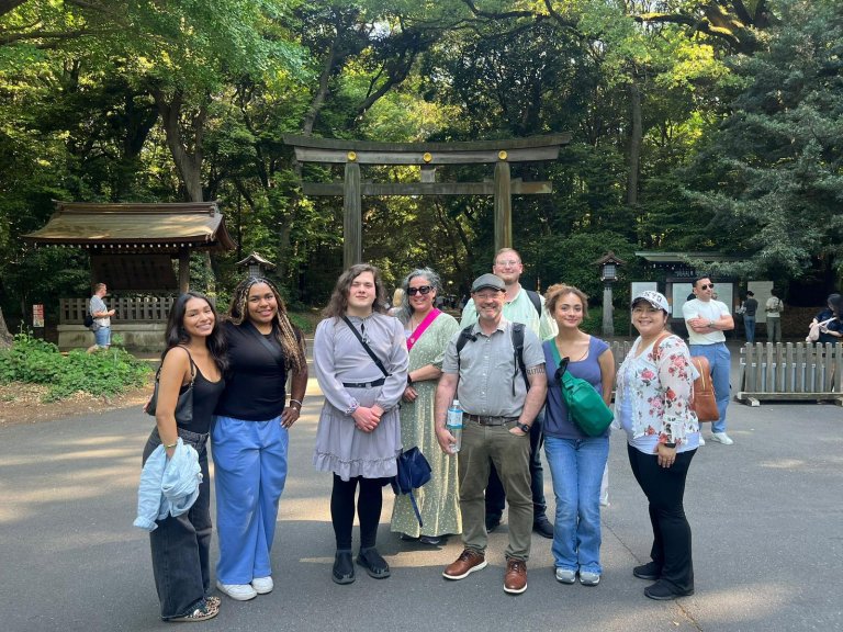 Students and faculty at a shrine