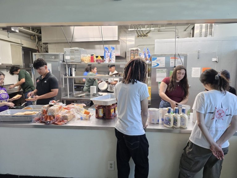 Students work in a kitchen