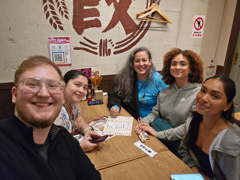 Students at a dinner table in Japan