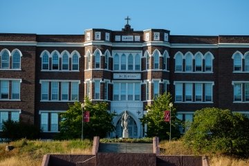 Photo of Old Main in the summer